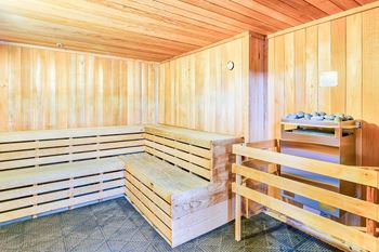 a finnish sauna with wooden walls and benches